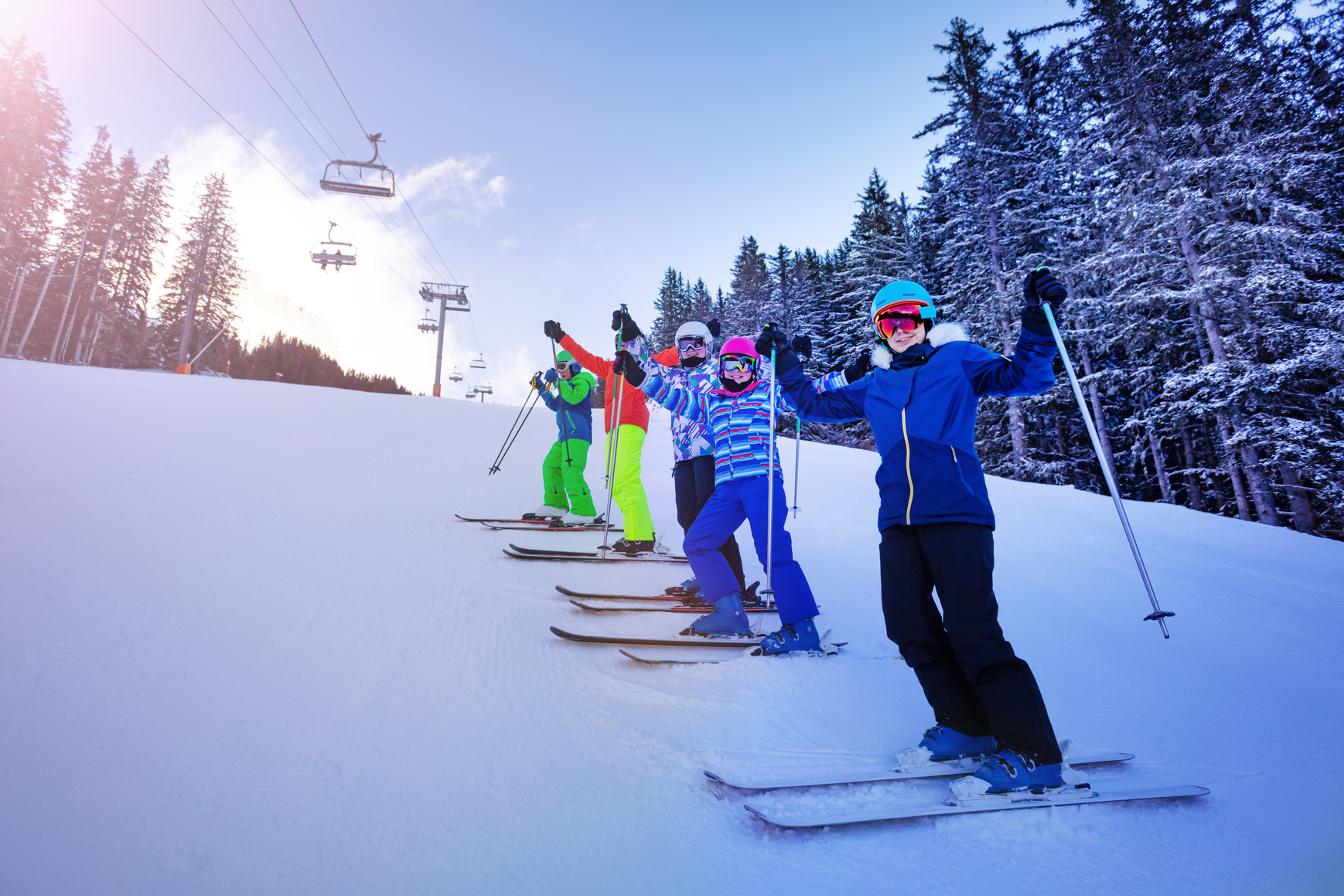 Group of Kids Skiing on Mountain Slope